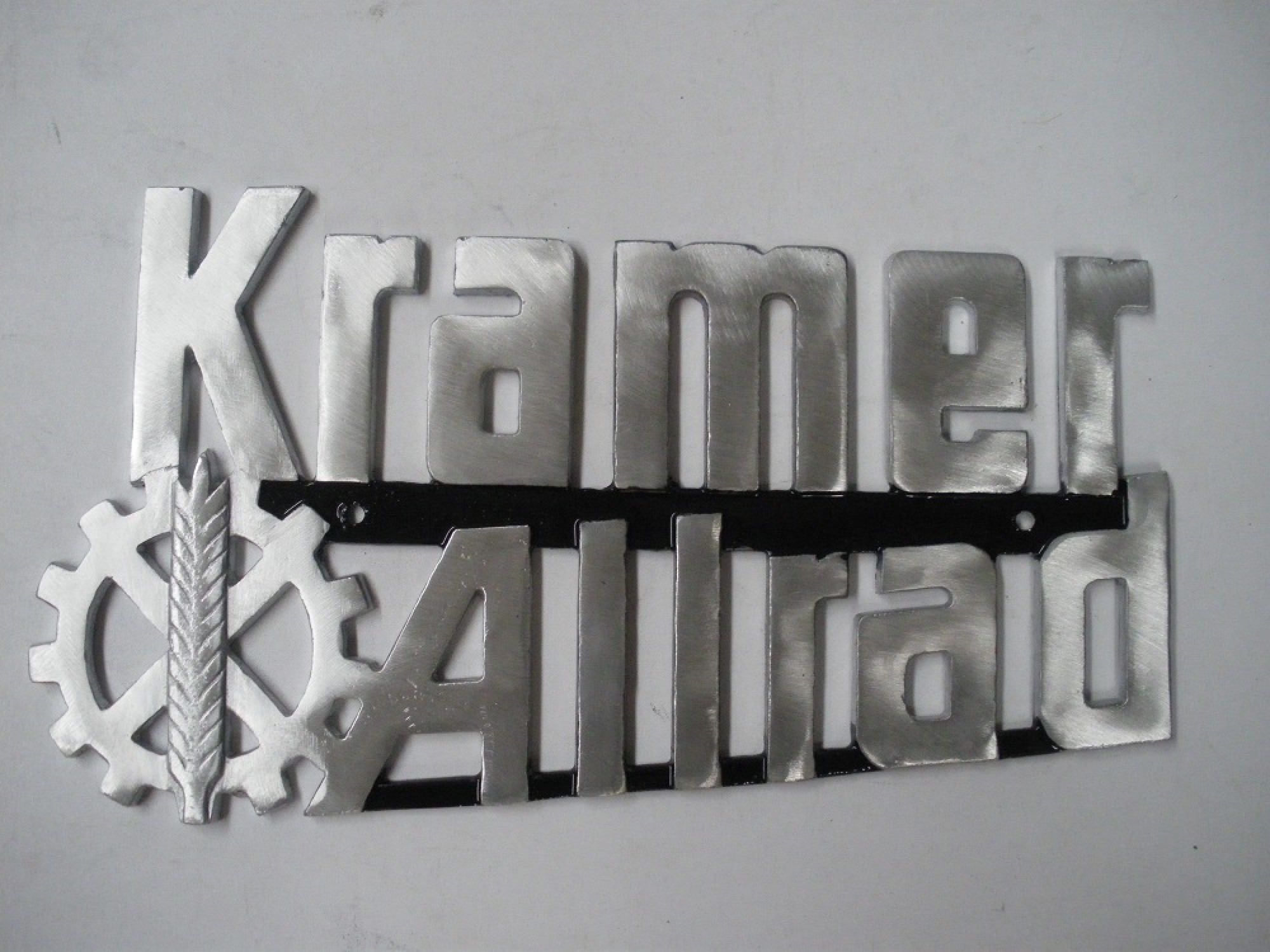 Kramer Allrad embleem