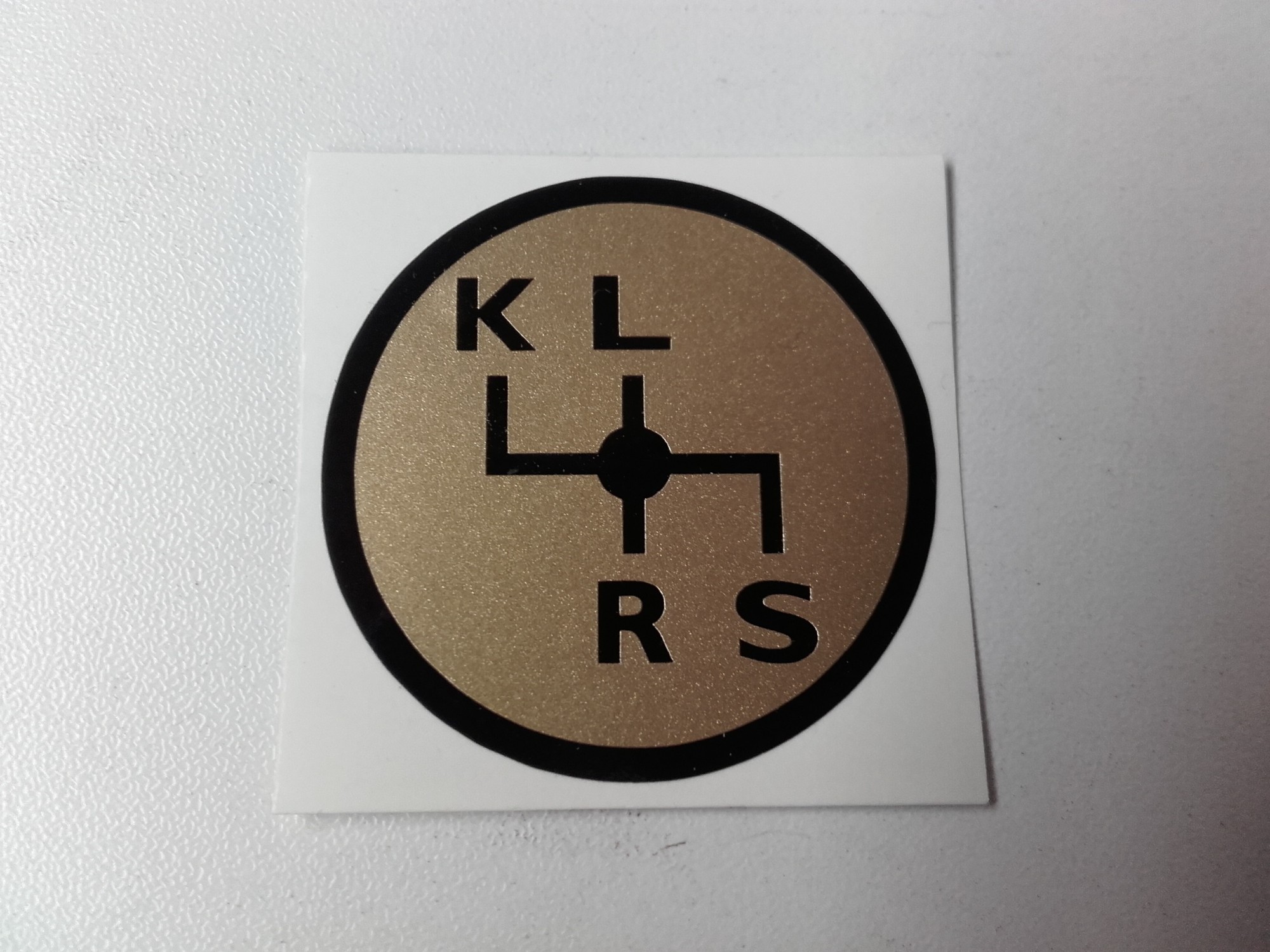 Schakelschema K-L-R-S goud rond